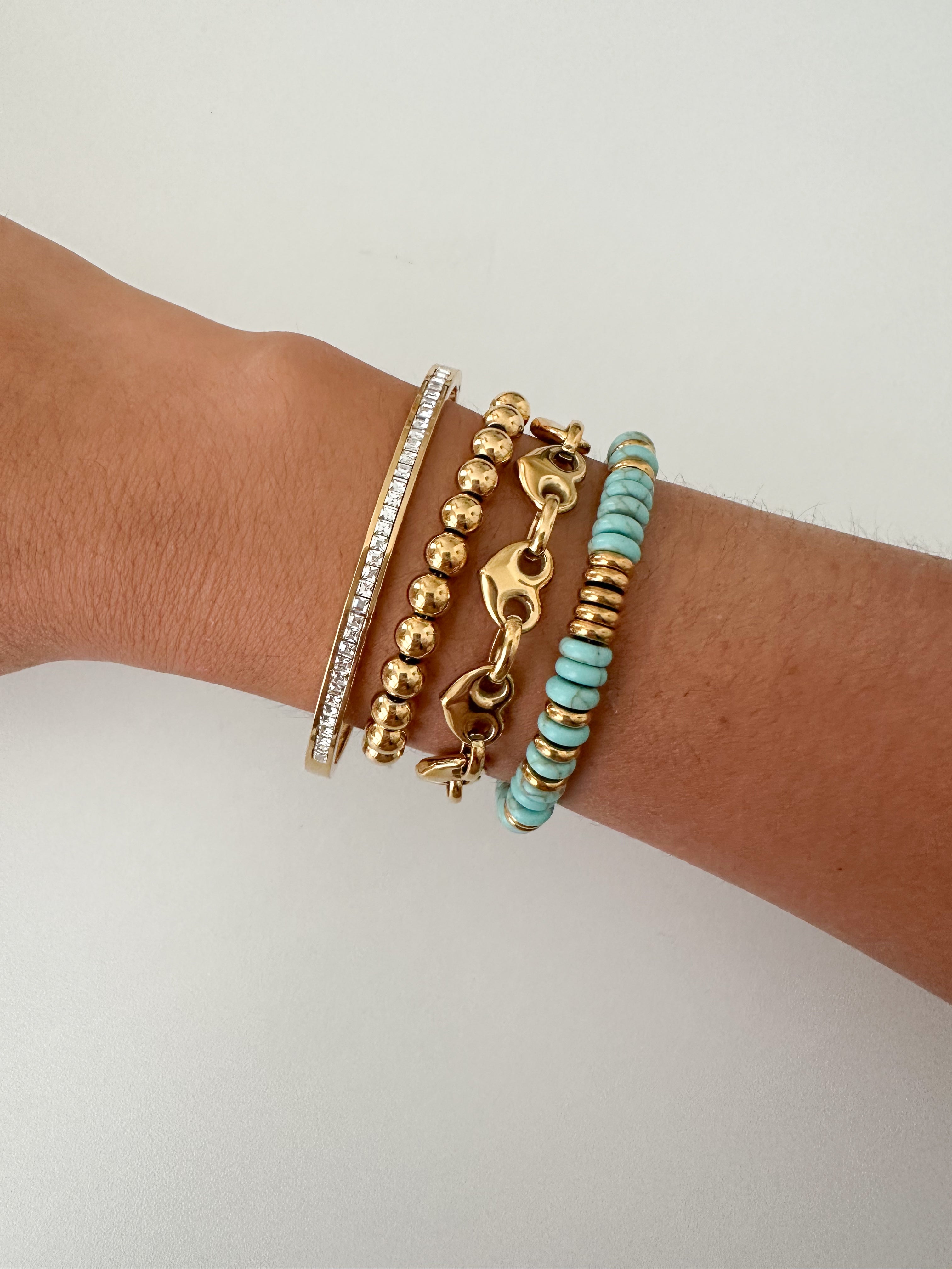 Pulsera Corazones Dorados